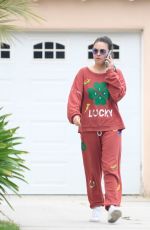 MILA KUNIS Dropping by a Friends House in Los Angeles 05/29/2024