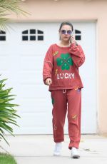MILA KUNIS Dropping by a Friends House in Los Angeles 05/29/2024