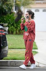 MILA KUNIS Dropping by a Friends House in Los Angeles 05/29/2024