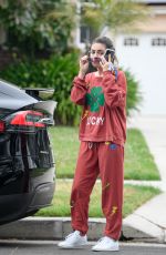 MILA KUNIS Dropping by a Friends House in Los Angeles 05/29/2024