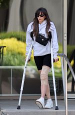 NINA DOBREV Out with Her Crutches in Santa Monica 06/18/2024