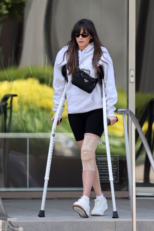 NINA DOBREV Out with Her Crutches in Santa Monica 06/18/2024