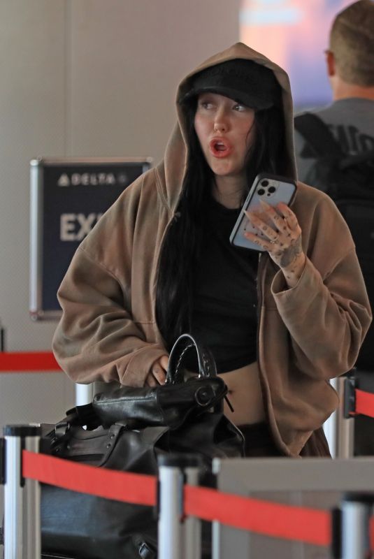 NOAH CYRUS at LAX Airport in Los Angeles 06/15/2024