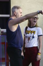 OLIVIA WILDE Out with a Mystery Guy in line at Hamburger Mary