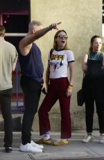 OLIVIA WILDE Out with a Mystery Guy in line at Hamburger Mary