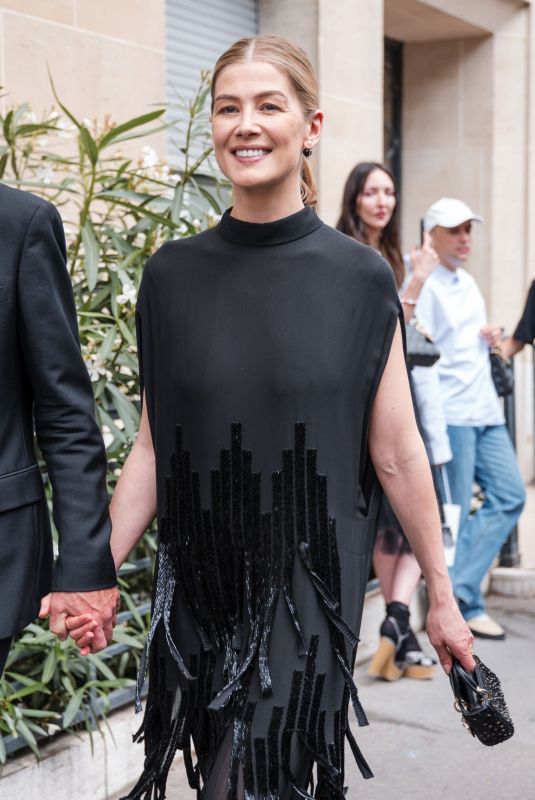 ROSAMUND PIKE Arrives aat Dior Fall 2024 Couture Show in Paris 06/24/2024