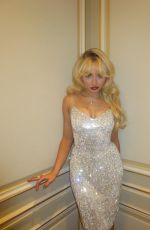 SABRINA CARPENTER at a Photoshoot in Paris 06/26/2024