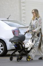 SUKI WATERHOUSE Out with Her Baby in Los Angeles 06/17/2024
