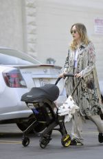 SUKI WATERHOUSE Out with Her Baby in Los Angeles 06/17/2024