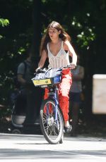 SURI CRUISE Out Biking at Central Park in New York 06/08/2024
