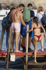 ALESSANDRA AMBROSIO in Bikini and Alexander Smurfit at a Beach in Ibiza 07/07/2024