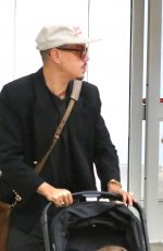 ASHLEE SIMPSON and Evan Ross at LAX Airport in Los Angeles 07/26/2024