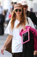 ASHLEE SIMPSON and Evan Ross at LAX Airport in Los Angeles 07/26/2024