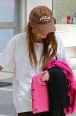 ASHLEE SIMPSON and Evan Ross at LAX Airport in Los Angeles 07/26/2024