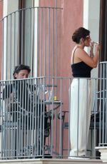 BELLA THORNE at Balcony of Her Hotel in Taormina Sicily 07/13/2024