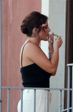 BELLA THORNE at Balcony of Her Hotel in Taormina Sicily 07/13/2024