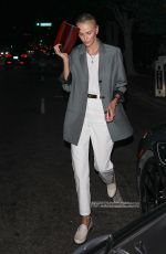CHARLIZE THERON Leaves Dinner at A.O.C. Restaurant in Los Angeles 07/10/2024