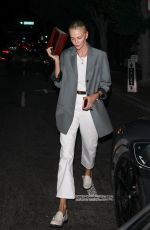 CHARLIZE THERON Leaves Dinner at A.O.C. Restaurant in Los Angeles 07/10/2024