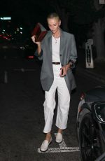 CHARLIZE THERON Leaves Dinner at A.O.C. Restaurant in Los Angeles 07/10/2024