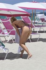 CHARLOTTE MCKINNEY in Bikini at a Beach in Miami 06/28/2024
