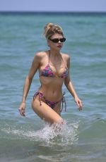 CHARLOTTE MCKINNEY in Bikini at a Beach in Miami 06/28/2024
