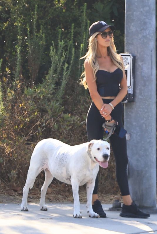 CHRISTINA HALL Out with Her Dog Around Her Neighborhood in Los Angeles 07/26/2024