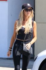 CHRISTINA HALL Out with Her Dog Around Her Neighborhood in Los Angeles 07/26/2024