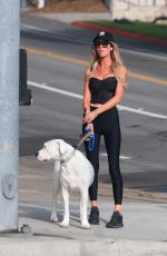 CHRISTINA HALL Out with Her Dog Around Her Neighborhood in Los Angeles 07/26/2024