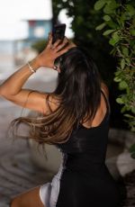 CLAUDIA ROMANI Poses in an Elegant Dress in Miami 07/07/2024