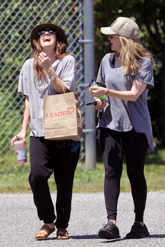 DREW BARRYMORE Out for Morning Walk with a Friend in The Hamptons 07/02/2024