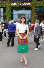 EMILIA JONES Arrives at Wimbledon in London 07/10/2024