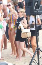 EMMA ROBERTS with a Friend at a Beach in Hamptons 07/06/2024