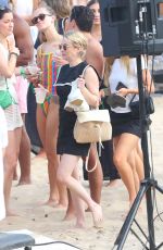 EMMA ROBERTS with a Friend at a Beach in Hamptons 07/06/2024