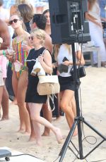 EMMA ROBERTS with a Friend at a Beach in Hamptons 07/06/2024