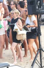 EMMA ROBERTS with a Friend at a Beach in Hamptons 07/06/2024