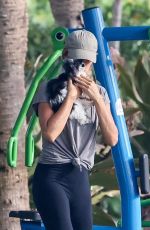 GISELE BUNDCHEN Enjoys an Early Morning Bike Ride in Miami Beach 07/30/2024
