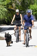 GISELE BUNDCHEN nad Joaquim Valente Riding Bikes Out in Miami 07/14/2024