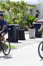GISELE BUNDCHEN nad Joaquim Valente Riding Bikes Out in Miami 07/14/2024