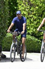 GISELE BUNDCHEN nad Joaquim Valente Riding Bikes Out in Miami 07/14/2024