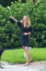 GISELE BUNDCHEN Out with Her Dog in Miami 07/12/2024