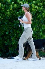 GISELE BUNDCHEN Walks Her Out Dog in Miami 07/01/2024