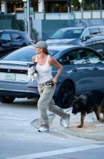 GISELE BUNDCHEN Walks Her Out Dog in Miami 07/01/2024