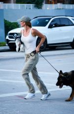 GISELE BUNDCHEN Walks Her Out Dog in Miami 07/01/2024