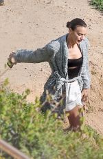 IRINA SHAYK at a Beach Photoshoot in Malibu 07/10/2024