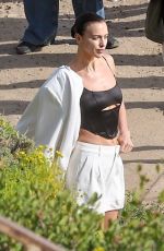 IRINA SHAYK at a Beach Photoshoot in Malibu 07/10/2024