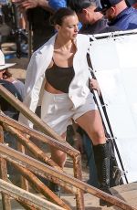 IRINA SHAYK at a Beach Photoshoot in Malibu 07/10/2024