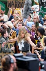 JENNIFER ANISTON Filming a Protest Scene for The Morning Show in Flatiron in New York 07/28/2024
