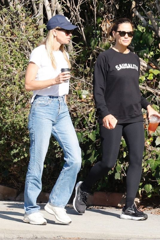 JENNIFER GARNER Enjoys an Iced Tea on a Morning Walk with a Friend in Los Angeles 07/26/2024