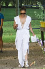 JENNIFER LOPEZ on a bike Ride with Benny Medina and her son Max in New York 07/18/2024