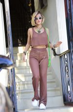 JOY CORRIGAN Waits for an Uber After a Meeting in Hollywood 07/15/2024